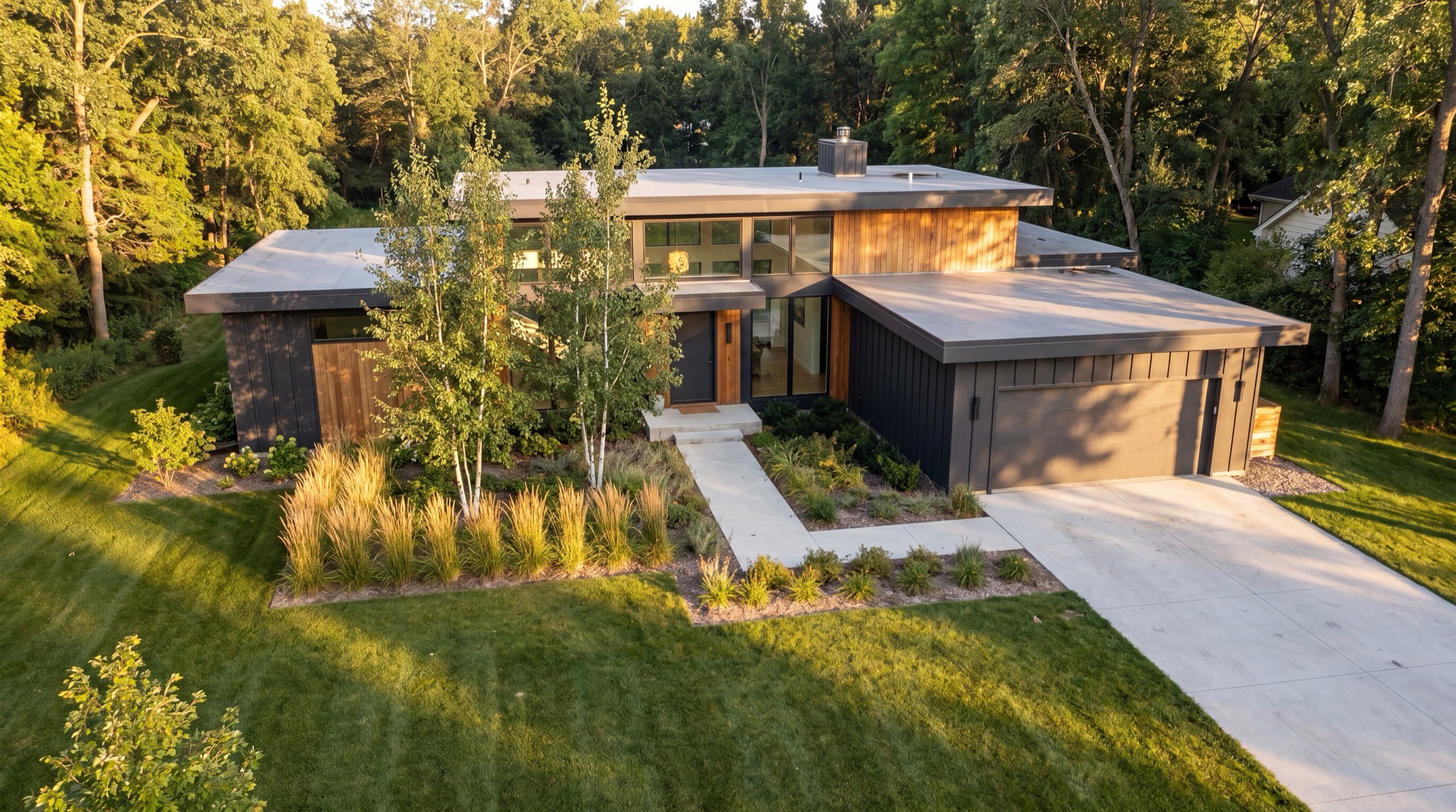 Aerial drone photo of a modern Twin Cities home at golden hour